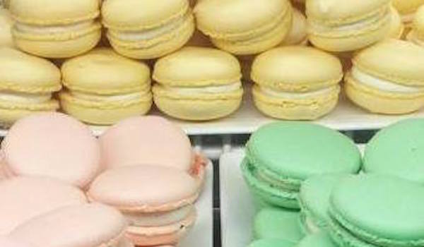 yellow, pink, and green macarons